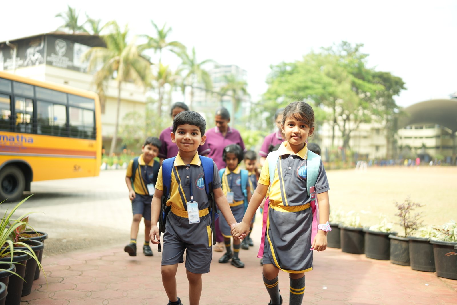 Students arriving at Devamatha School