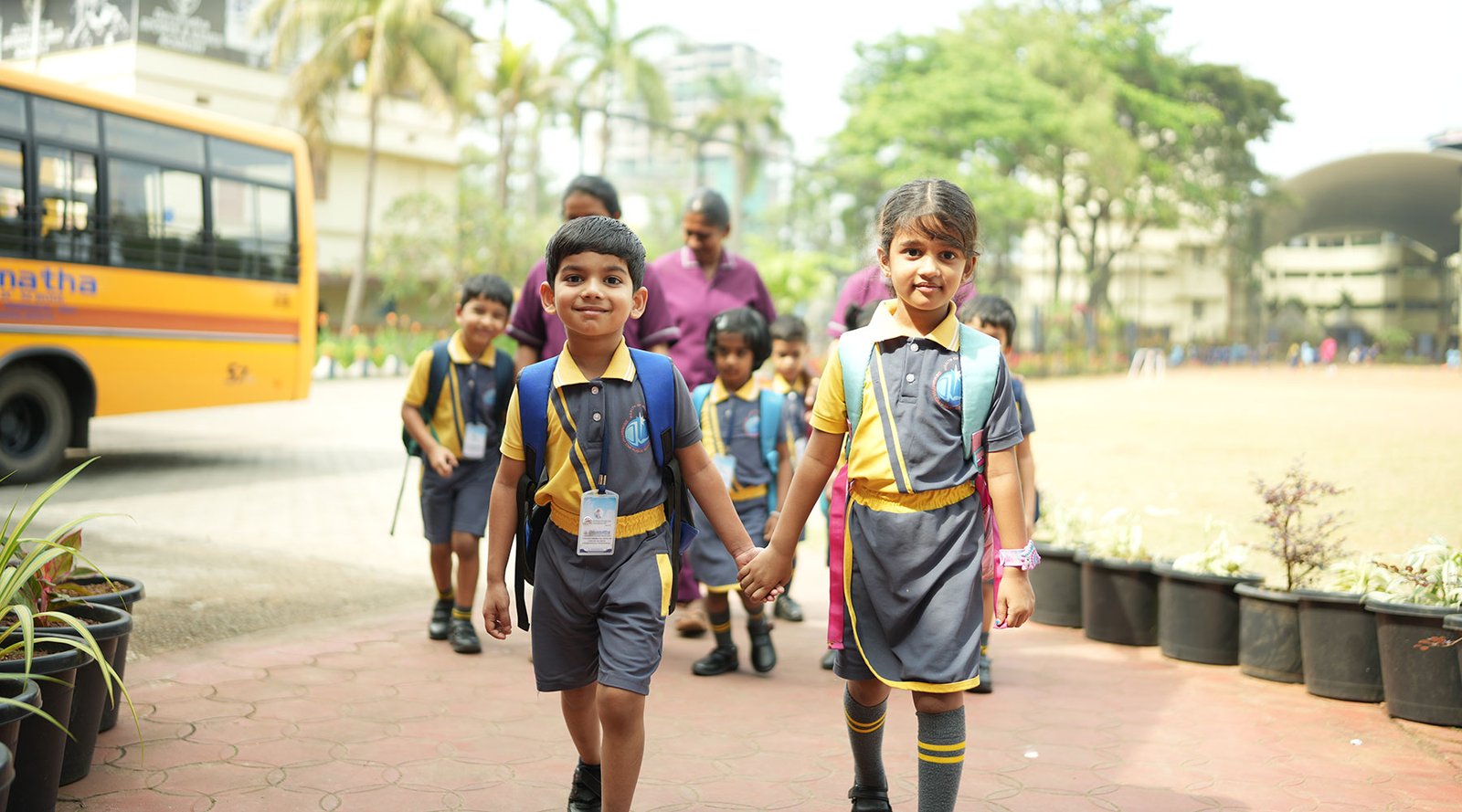 Devamatha primary students walking on campus