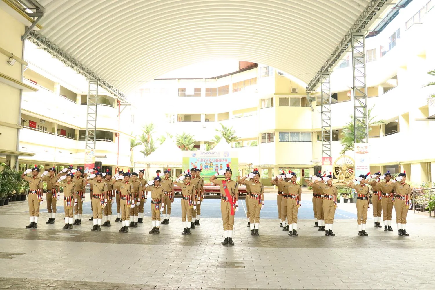 Student police cadets assembled in the school courtyard
